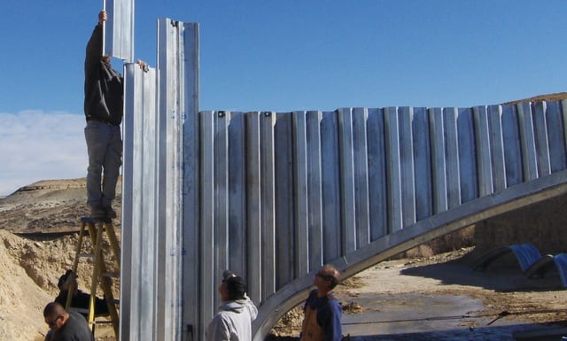 Installing-steel-piling-headwall-on-a-box-culvert