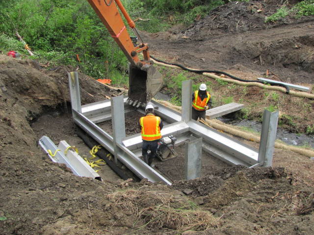 Machine-filling-of-Bolt-A-Bin-bridge-abutment