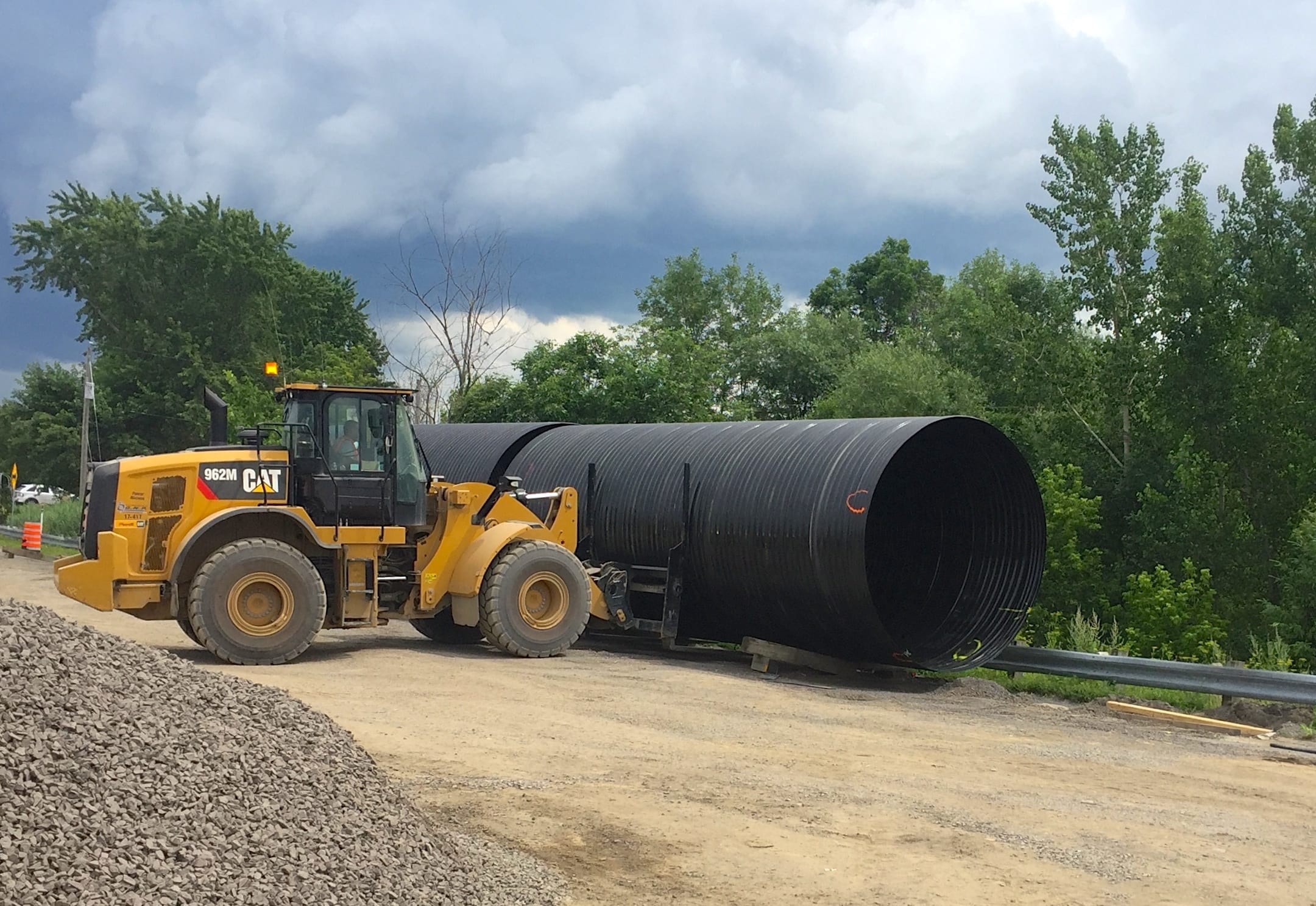 Payloader lifting section of Polymer-Coated Corrugated Steel Pipe 