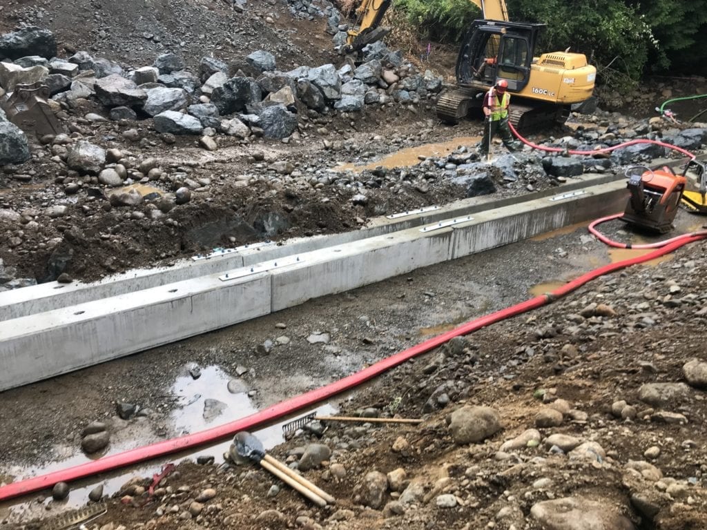 Wide view of precast footings for buried bridge