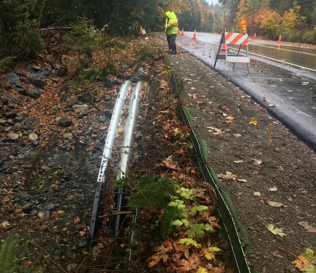 Road view of stream crossing with step-back wall section