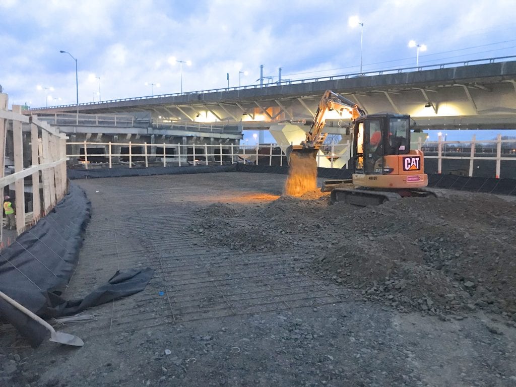 Night crew working on demolition access ramp with AIL MSE Retaining Walls