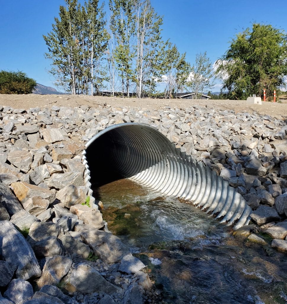 Angled view of finished Bolt-A-Plate culvert replacement
