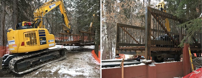 Steel spread footing and completed prefab trail bridge