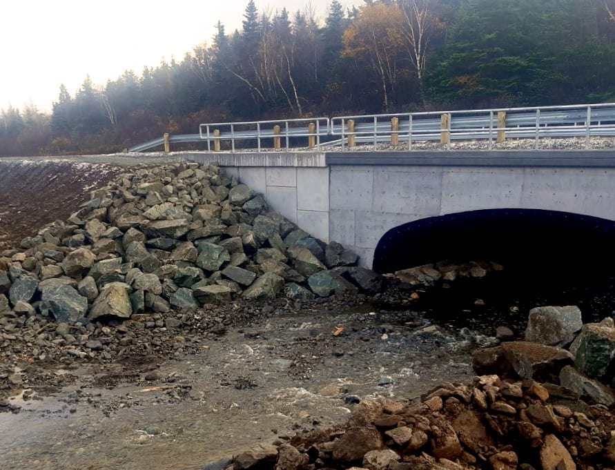 Completed buried metal bridge stream crossing