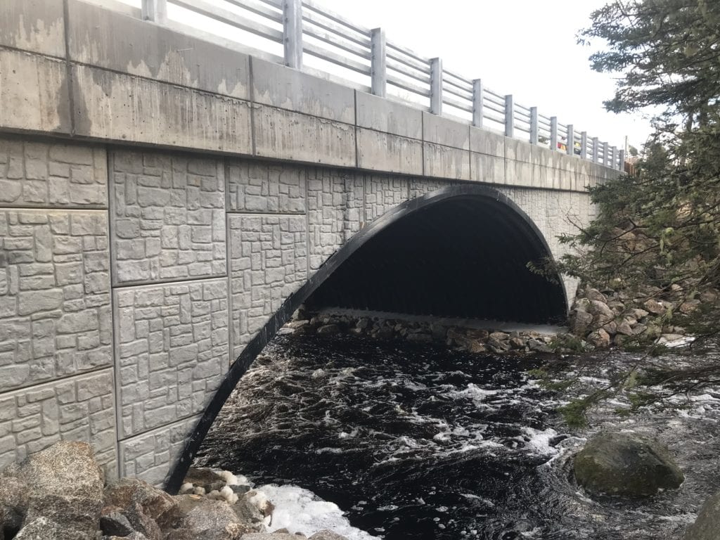 Angled view into buried metal bridge