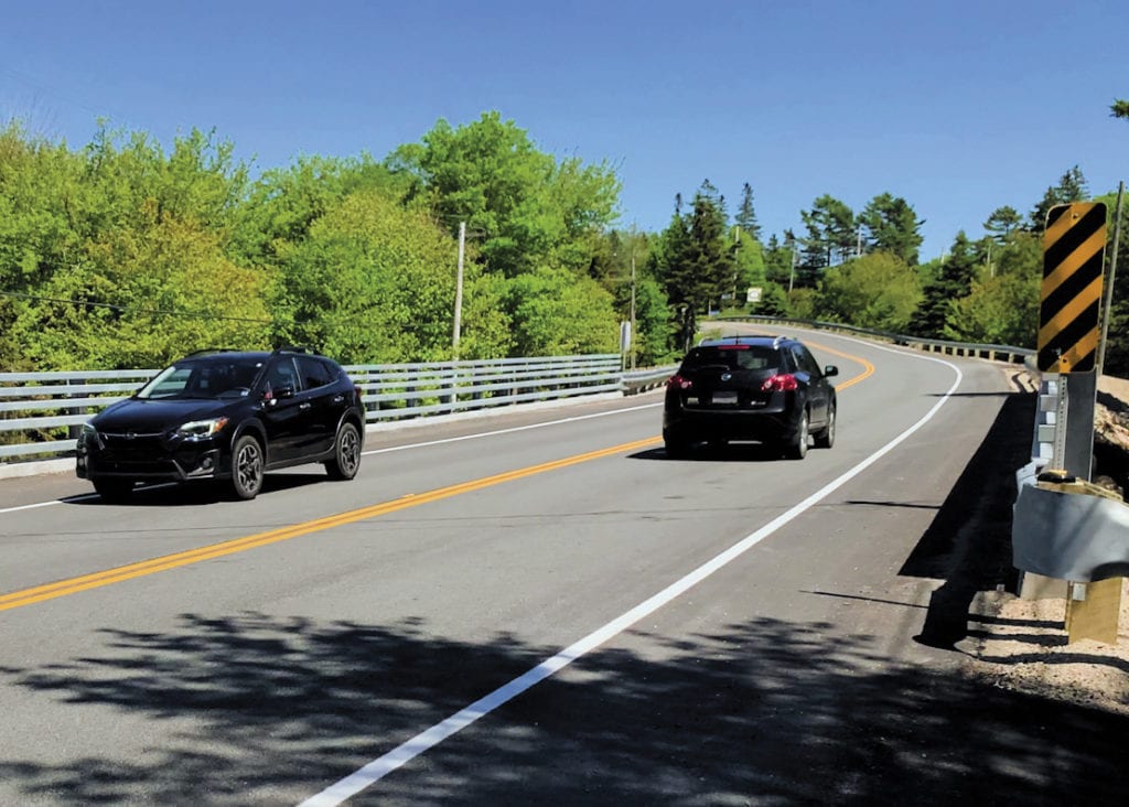 Wide smooth road surface over buried metal bridge