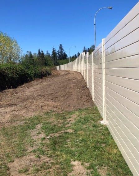 Other side of highway noise barrier wall in Campbell River
