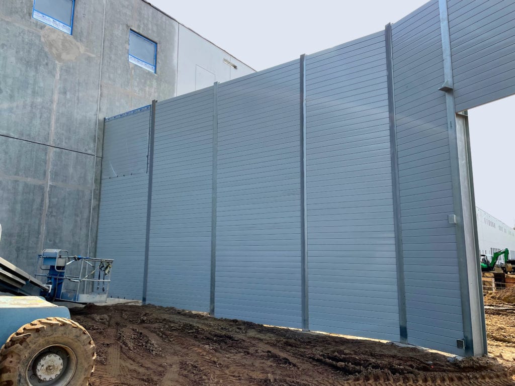 View of sound barrier wall attached to building