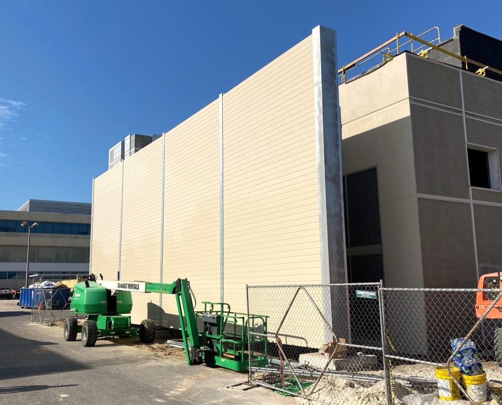 Angled view of sound barrier wall for generator building