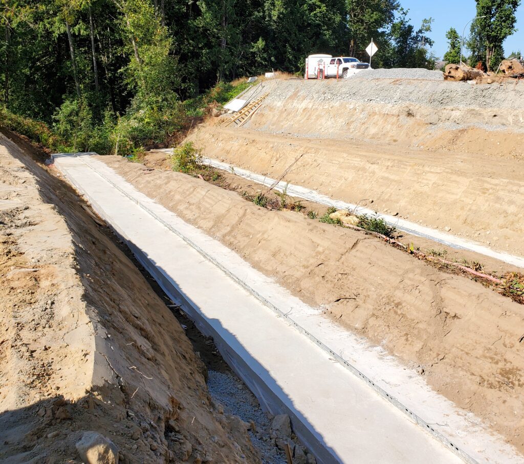 Prepared foundation footings for Bolt-A-Plate culvert