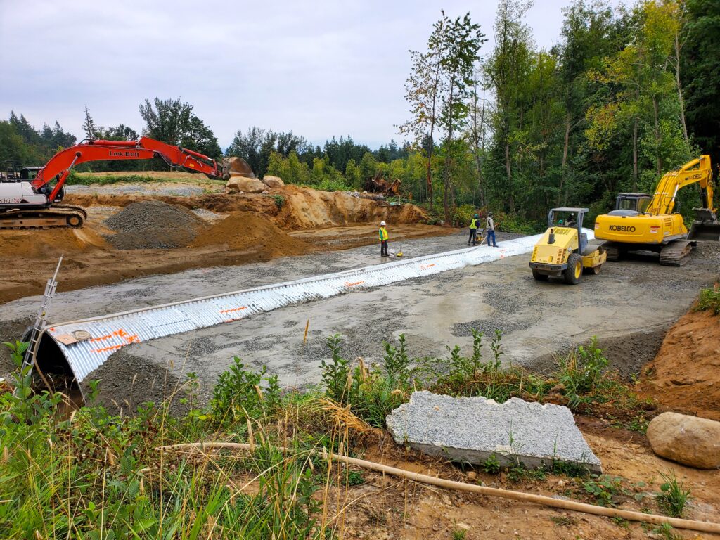 Backfilling underway for Bolt-A-Plate culvert