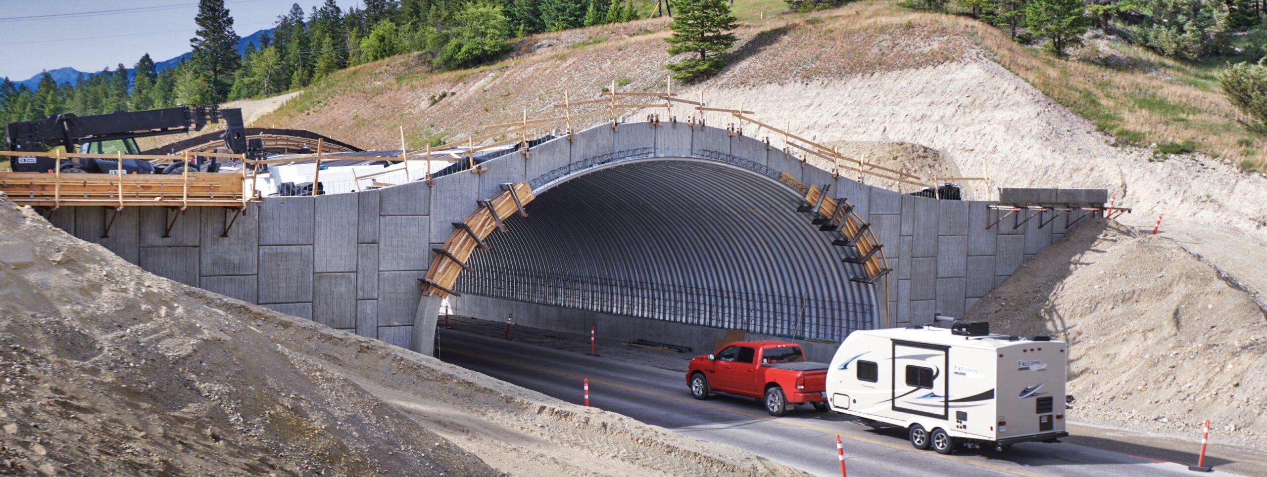 view of Ultra-Cor structural steel plate wildlife overpass under construction