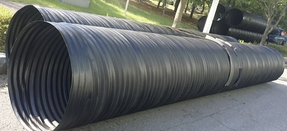 High-performance laminate corrugated steel pipes