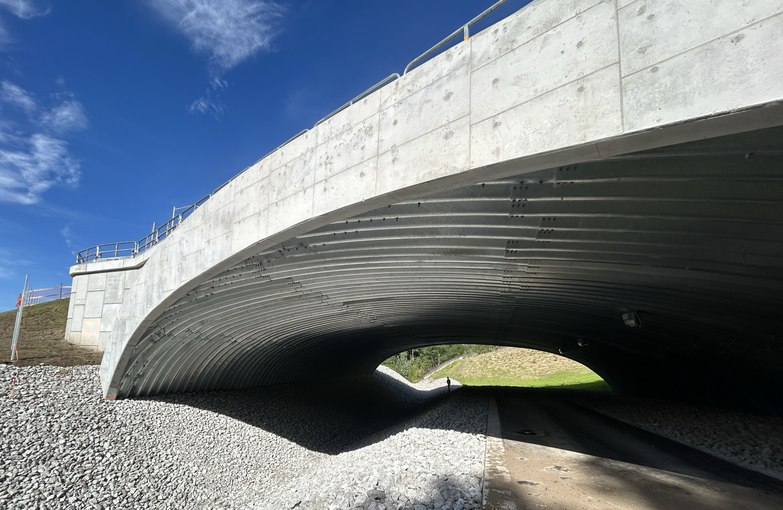 Interior view of AIL Ultra-Cor Buried Metal Bridge and MSE Precast Panel Walls with skewed ends and concrete collars